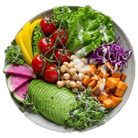 Plate full of a salad with cherry tomatoes, sliced avocado, chickpeas, sweet potatoes, red cabbage, yellow bell peppers, and watermelon radishes.