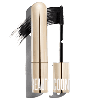 Tube of Beautycounter Think Big All-in-One Mascara next to its applicator brush smearing black mascara.