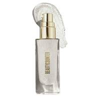 Bottle of Beautycounter Glow First Priming Serum in front of a smear of clear gel.